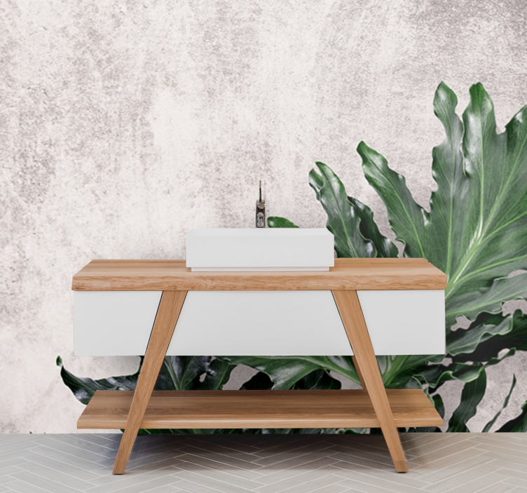 Murais de Parede Folhas verdes sobre um fundo de concreto - TenStickers