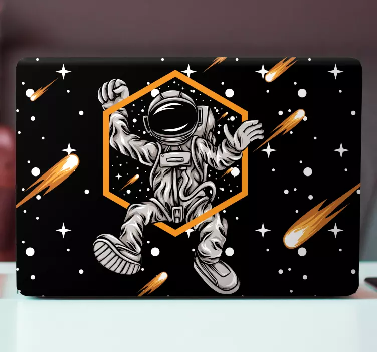 Autocolante para portátil astronauta flutuando no cósmico - TenStickers