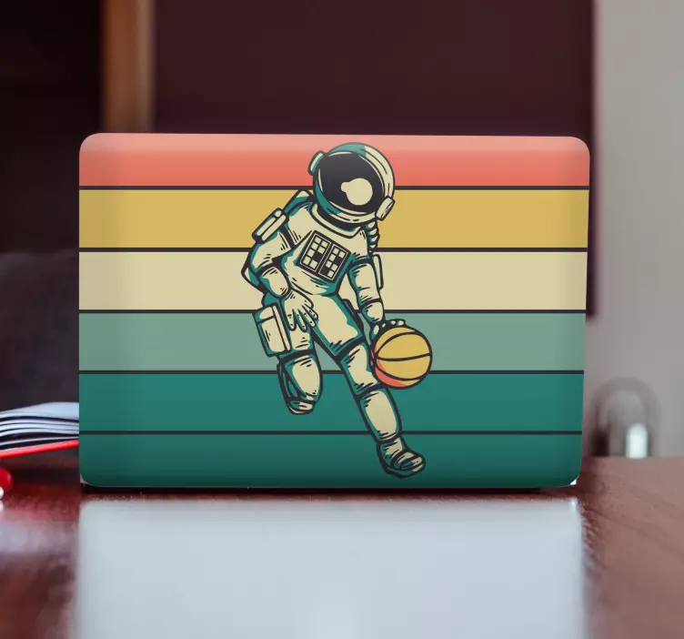 Autocolante para laptop astronauta jogando bola - TenStickers
