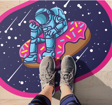 Tapete vinílico juvenil astronauta em donut - TenStickers
