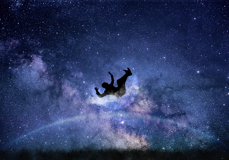 Tapete vinílico estrelas caindo através do cosmos - TenStickers